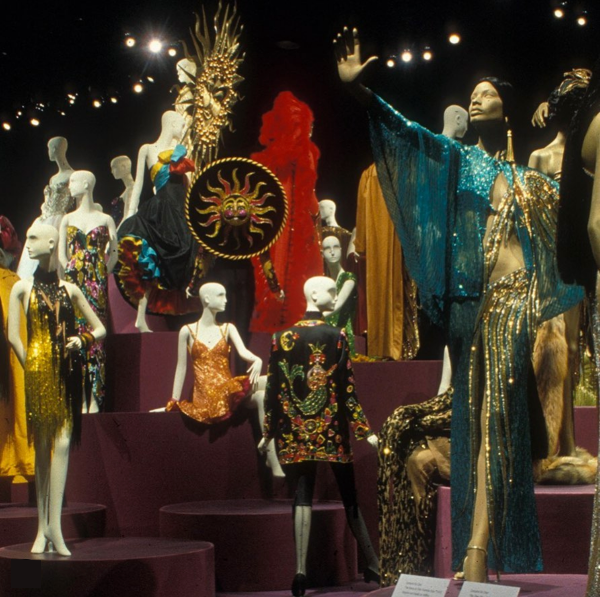 group of mannequins in bright sparkly garments